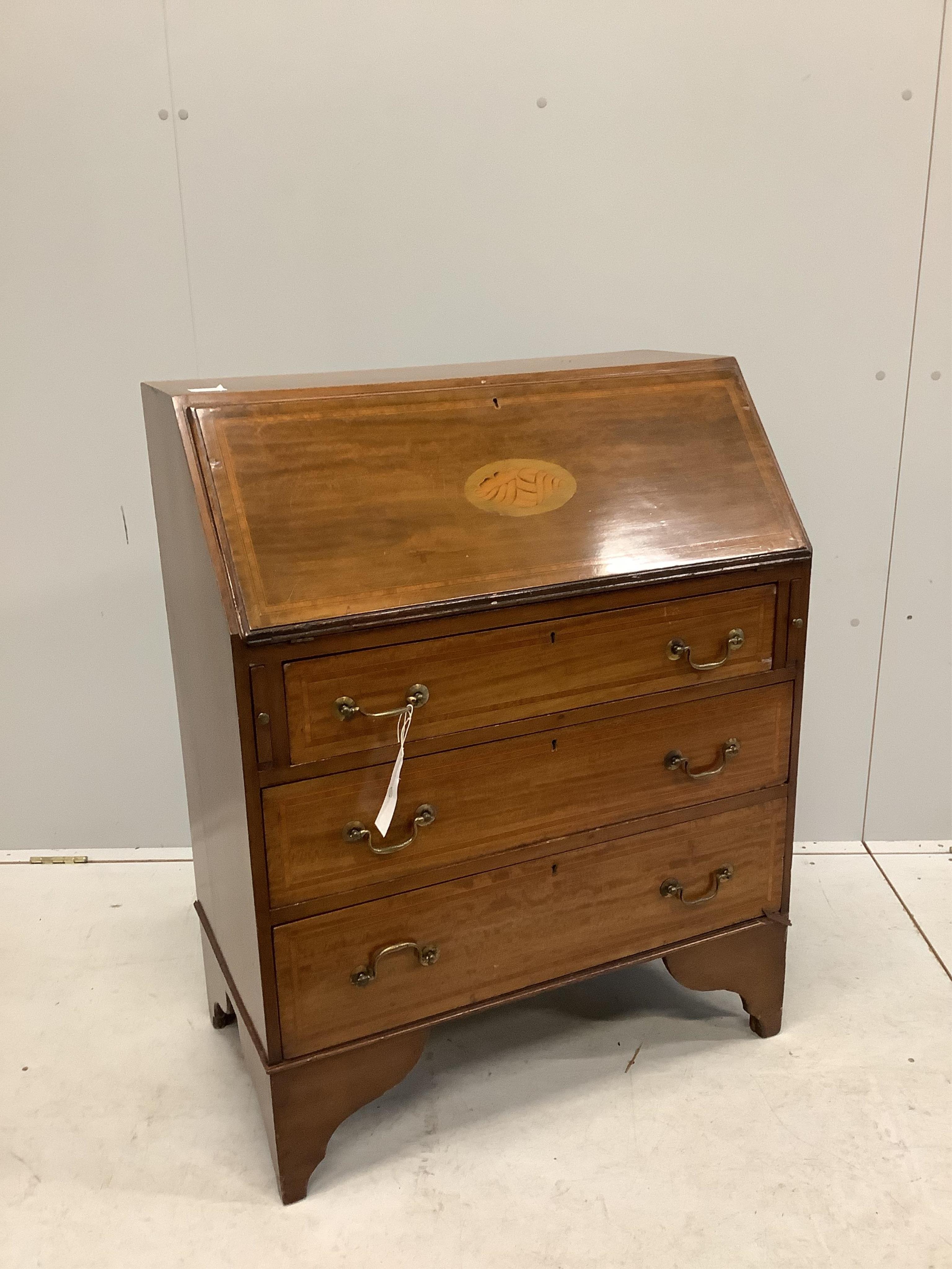 An Edwardian inlaid mahogany bureau fitted three drawers, width 75cm, depth 42cm, height 95cm. Condition - fair